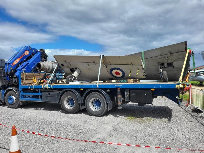 The jet’s wings are delivered on a low-loader