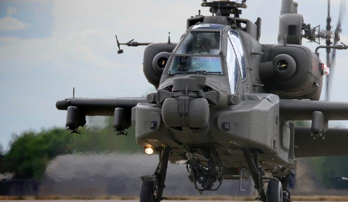 An AH-64E comes into the hover at Wattisham after conducting a post-re-build air test. The programme tests the aircraft through its full flight envelope prior to release to service.