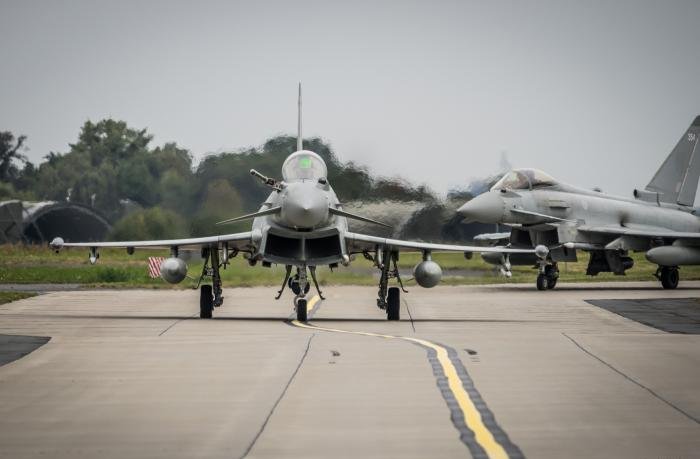 Fully armed Typhoons after touching down in Poland