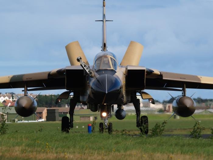 A Saudi Tornado IDS taxiing at RAF Lossiemouth with its air-to-air refuelling probe and air brakes extended.