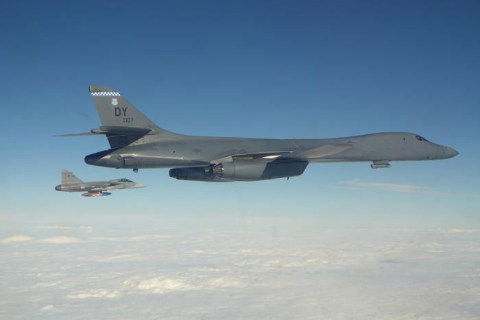 A B-1B Lancer (86-0107/DY) from the 7th BW’s 28th BS at Dyess AFB, Texas, flies in formation with a Czech Air Force JAS 39C Gripen during an interoperability sortie over Eastern Europe during BTF-E 24-1 on October 26.