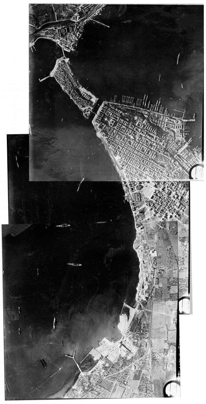 A composite of several reconnaissance photos taken just before the Fleet Air Arm’s raid. Several battleships can be seen in the outer harbour on the centre-left of the image, while at top right the inner harbour contains cruisers and destroyers tied up against the shore.