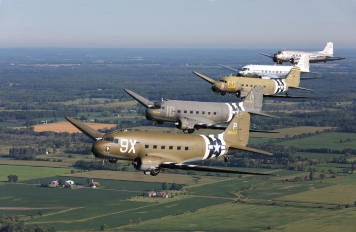 A quintet of the DC-3/C-47 ‘breed’ in flight with the D-Day Squadron