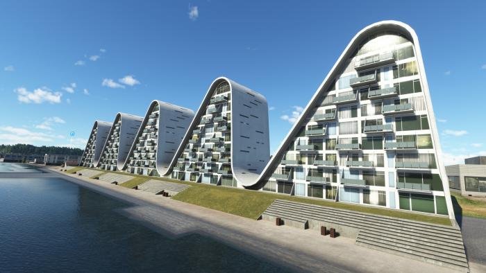 The Wave is a modern residential building complex alongside Skyttehus Bay in Demark.