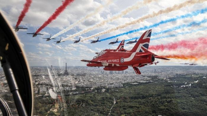 The Red Arrows flying a mixed formation flypast with the Patrouille de France over Paris in honour of a state visit from King Charles III.