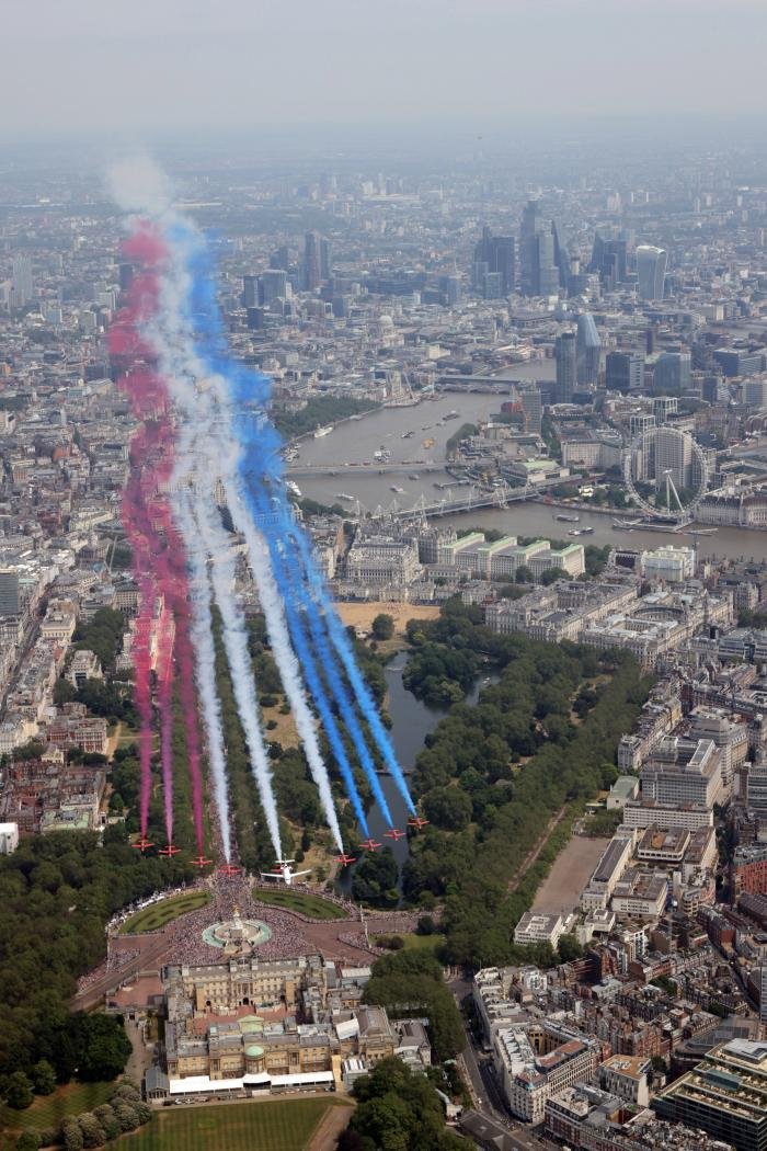 The Red Arrows flanking an Envoy during the King’s birthday flypast on June 17, 2023, over The Mall and Buckingham Palace.