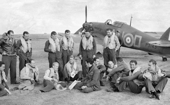 A group of No 310 Squadron pilots at Duxford on 7 September 1940, with Sgt Bohumír Fürst standing second from right, and the original P3143 in the background.