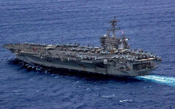 The US Navy’s Nimitz-class aircraft carrier, USS Carl Vinson (CVN-70), transits the Pacific Ocean during ANNUALEX 2023 on November 10, 2023. ANNUALEX 2023 was a multilateral exercise conducted by the Royal Australian Navy, Royal Canadian Navy, Japan Maritime Self-Defense Force, and US Navy to demonstrate naval interoperability and a joint commitment to a free and open Indo-Pacific region.