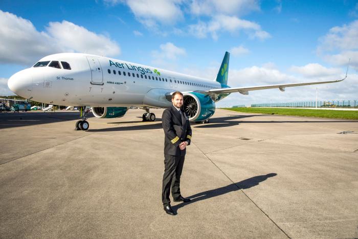 Aer Lingus First Officer Conor Murray in front oof the one of the airline’s Airbus A320neo aircraft
