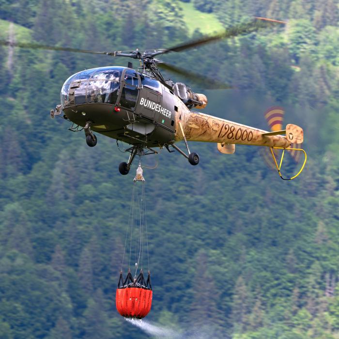 The Alouette III can be equipped with a Bambi Bucket for aerial firefighting missions